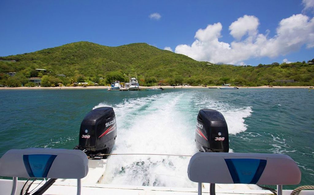 Private water taxi between St. Kitts and Nevis with Nevis Peak in the distance