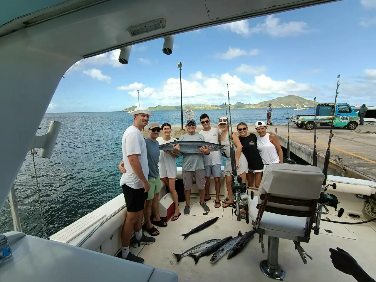 Charter guests at the dock with their catch after a Nevis fishing trip