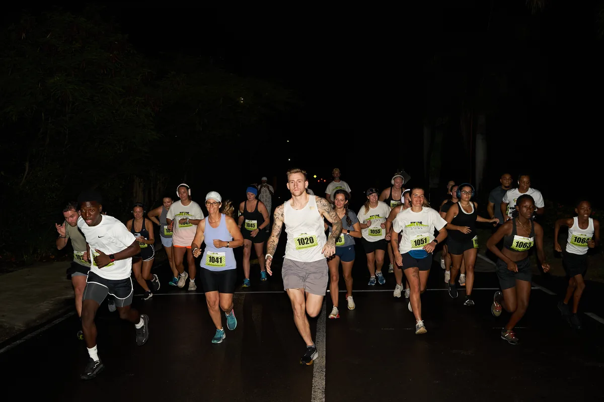Runners setting off in darkness at the start of the Nevis Marathon