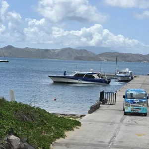 Private water taxi departing Oualie Pier in Nevis